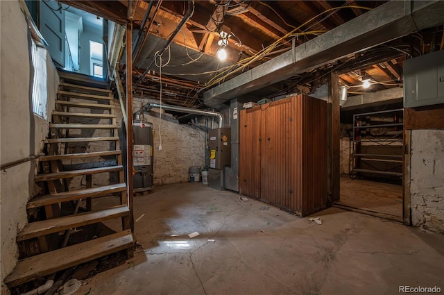 1024 Greenwood Ave, Canon City, CO 81212 - basement with gas water heater, stairway, and heating unit