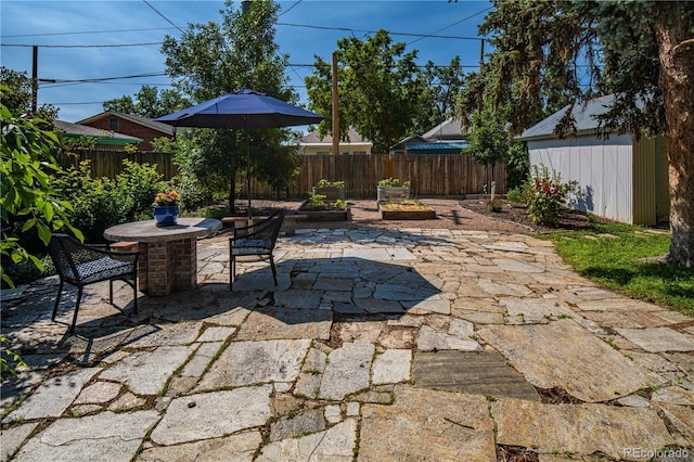 1024 Greenwood Ave, Canon City, CO 81212 - fenced backyard featuring a patio area and outdoor dining space