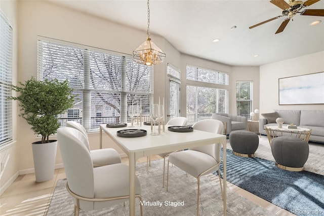 dining room with a wealth of natural light, baseboards, a ceiling fan, and recessed lighting