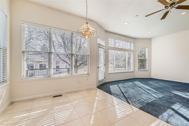 tiled spare room with recessed lighting, visible vents, baseboards, and a ceiling fan