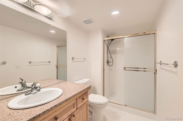 full bath featuring visible vents, a shower stall, toilet, recessed lighting, and vanity