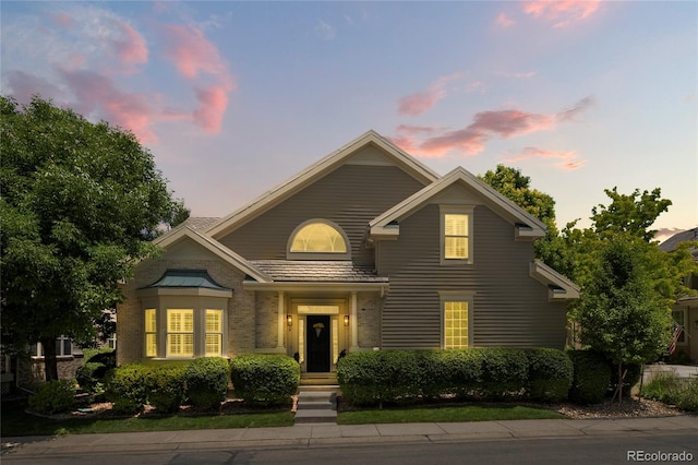 4545 S Monaco St Unit 114, Denver, CO 80237 - view of front facade featuring brick siding