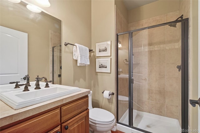 4545 S Monaco St Unit 114, Denver, CO 80237 - bathroom with vanity and a shower stall