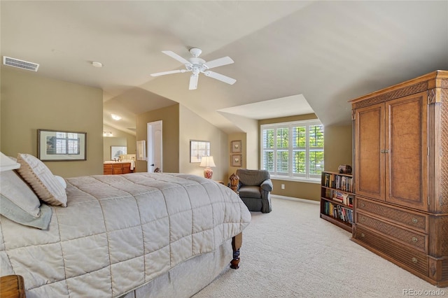 4545 S Monaco St Unit 114, Denver, CO 80237 - bedroom featuring light colored carpet, vaulted ceiling, and a ceiling fan