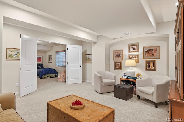 4545 S Monaco St Unit 114, Denver, CO 80237 - living room with light colored carpet