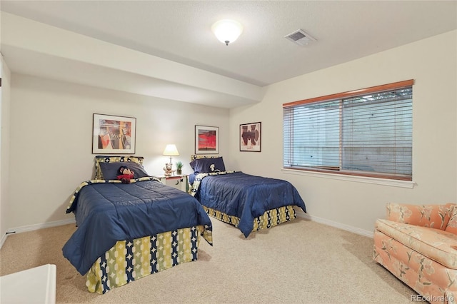 4545 S Monaco St Unit 114, Denver, CO 80237 - carpeted bedroom featuring baseboards