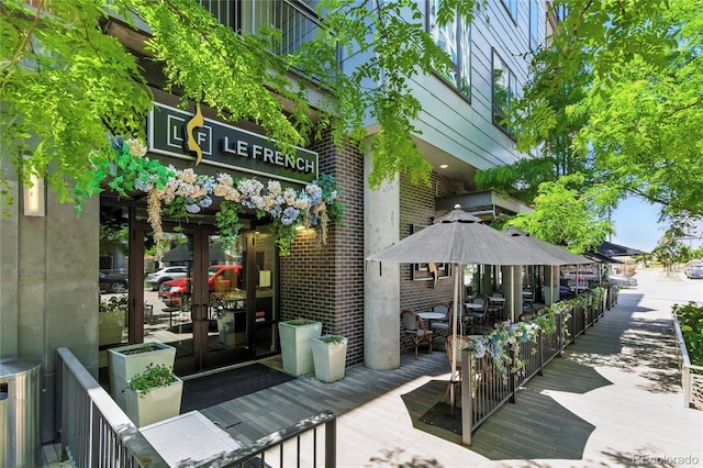 4545 S Monaco St Unit 114, Denver, CO 80237 - wooden deck with french doors