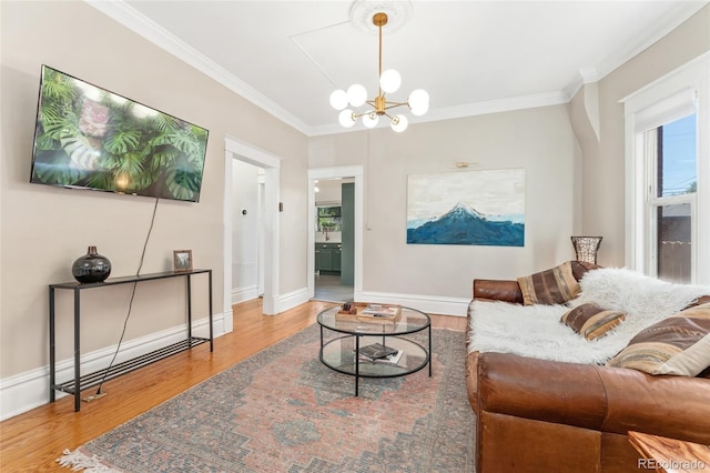 222 S Logan St, Denver, CO 80209 - living area with a chandelier, wood finished floors, and ornamental molding