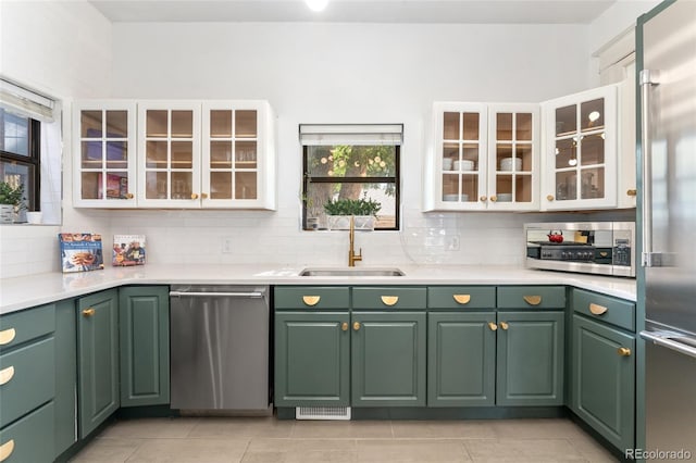 222 S Logan St, Denver, CO 80209 - kitchen featuring stainless steel appliances and green cabinets