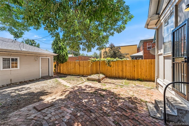 222 S Logan St, Denver, CO 80209 - fenced backyard with a patio area