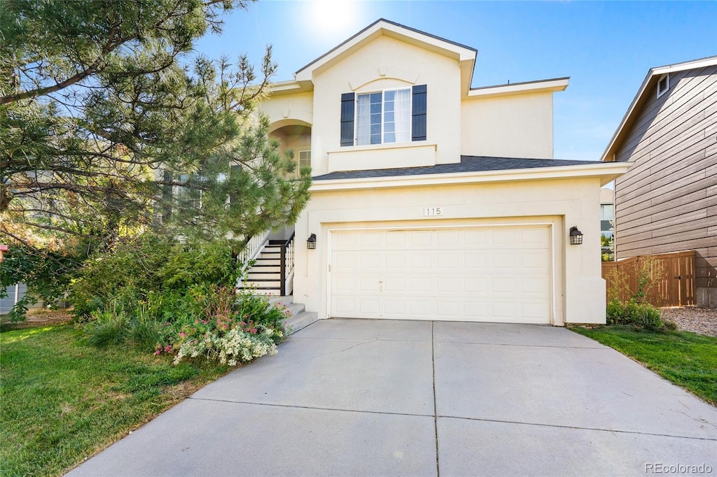 view of front of property featuring a garage