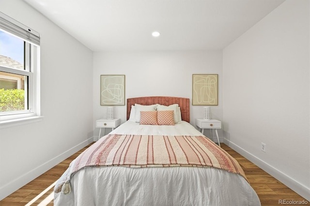5554 S Ward Way, Littleton, CO 80127 - bedroom featuring baseboards, recessed lighting, and wood finished floors