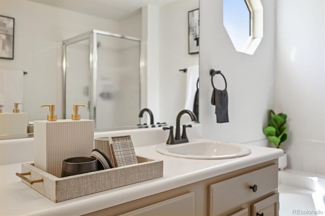5554 S Ward Way, Littleton, CO 80127 - full bathroom featuring a stall shower and vanity