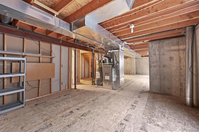 5554 S Ward Way, Littleton, CO 80127 - unfinished basement featuring gas water heater and heating unit