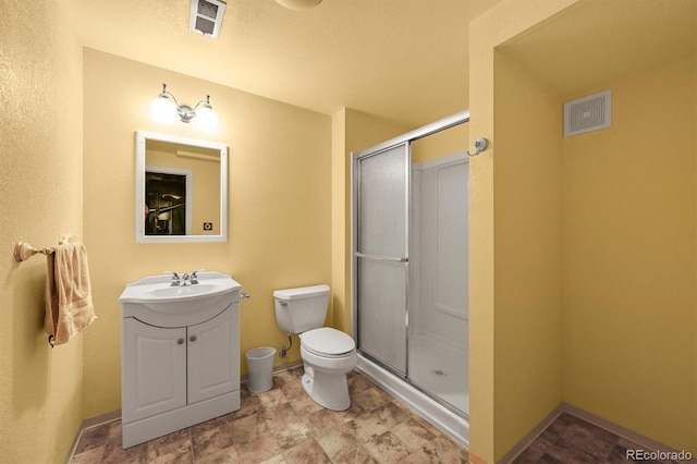 5554 S Ward Way, Littleton, CO 80127 - bathroom with a stall shower, toilet, vanity, and baseboards