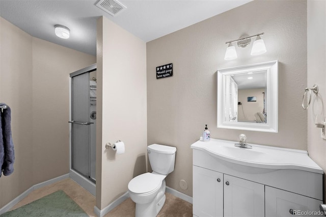 full bathroom featuring visible vents, a shower stall, baseboards, toilet, and vanity