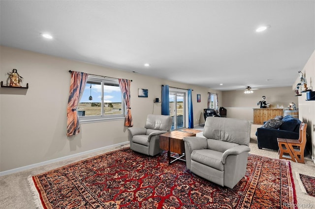 carpeted bedroom featuring recessed lighting, baseboards, and access to outside