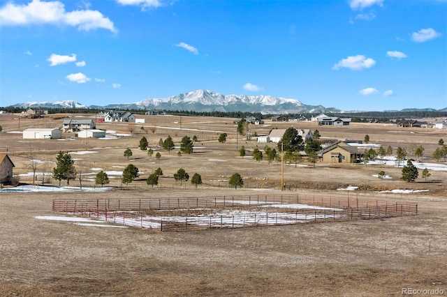 mountain view featuring a rural view