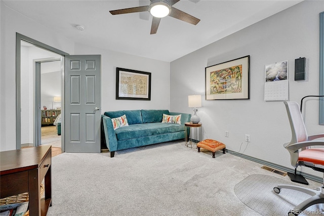 11820 W 66th Pl Unit C, Arvada, CO 80004 - carpeted living area with a ceiling fan and baseboards