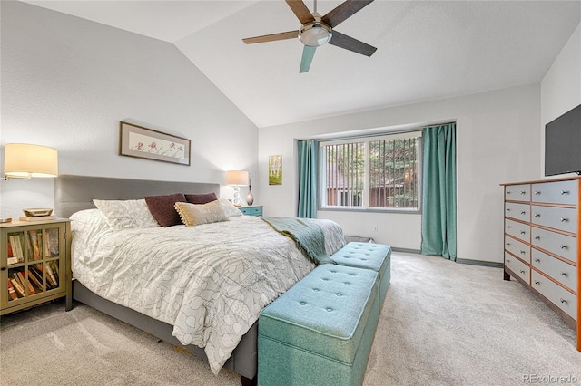 11820 W 66th Pl Unit C, Arvada, CO 80004 - carpeted bedroom featuring vaulted ceiling, ceiling fan, and baseboards