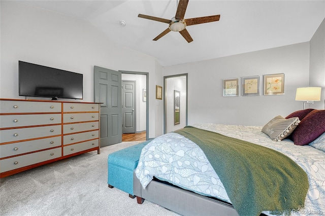 11820 W 66th Pl Unit C, Arvada, CO 80004 - bedroom with vaulted ceiling, carpet, and a ceiling fan