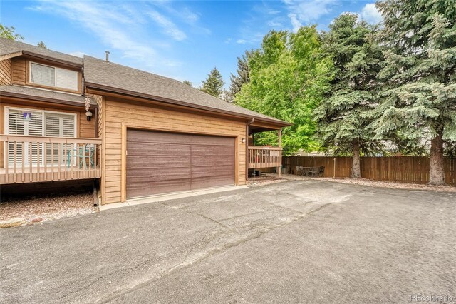 11820 W 66th Pl Unit C, Arvada, CO 80004 - garage featuring driveway