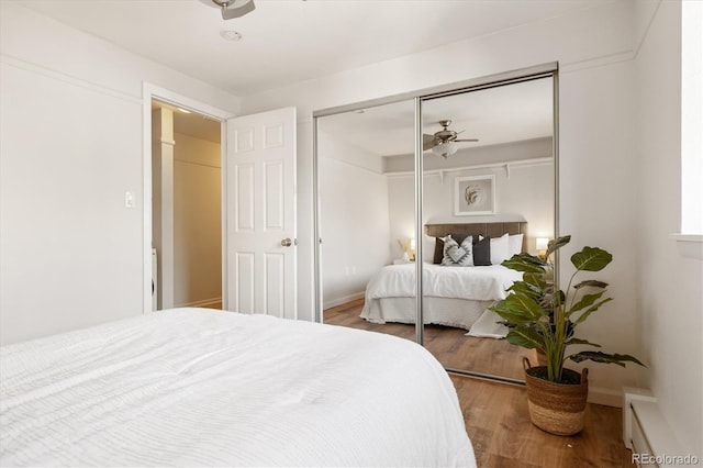 bedroom featuring hardwood / wood-style flooring and a closet