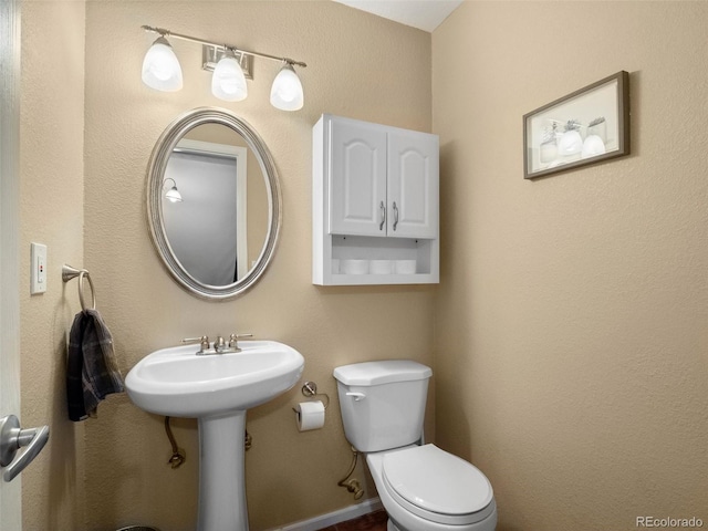 1517 S Owens St Unit 9, Denver, CO 80232 - bathroom with toilet and a sink