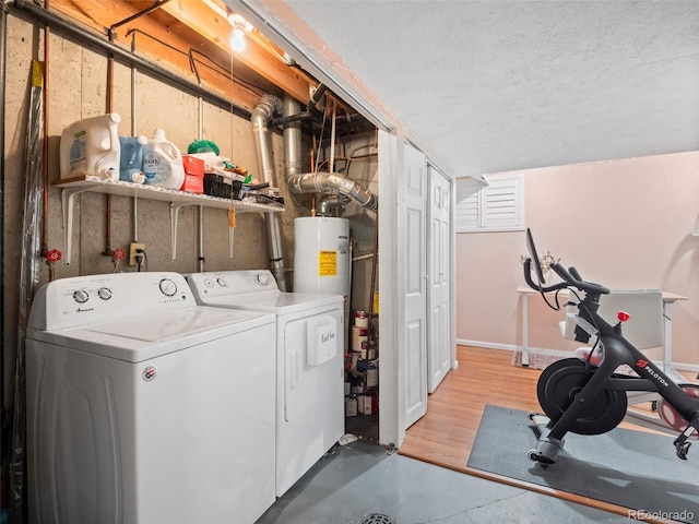 1517 S Owens St Unit 9, Denver, CO 80232 - interior space featuring laundry area, washing machine and dryer, and gas water heater