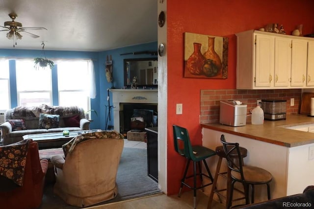 living room featuring ceiling fan