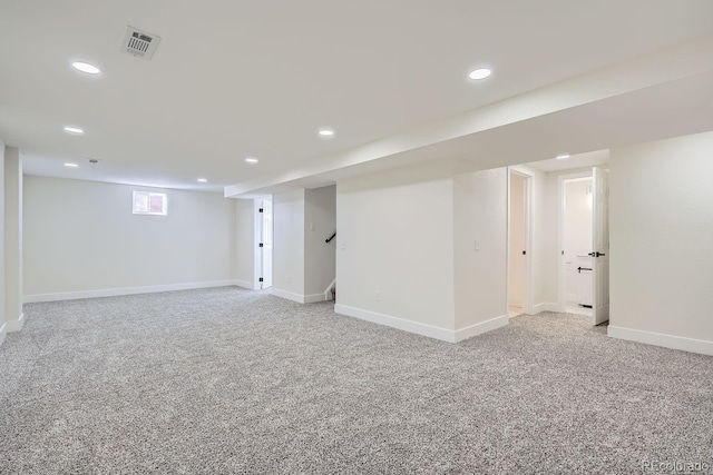 basement featuring carpet