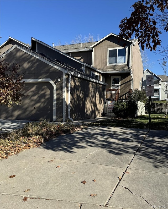 view of front of home with a garage and driveway