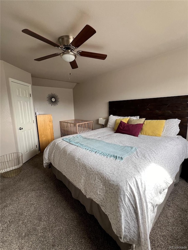 bedroom featuring ceiling fan and carpet floors