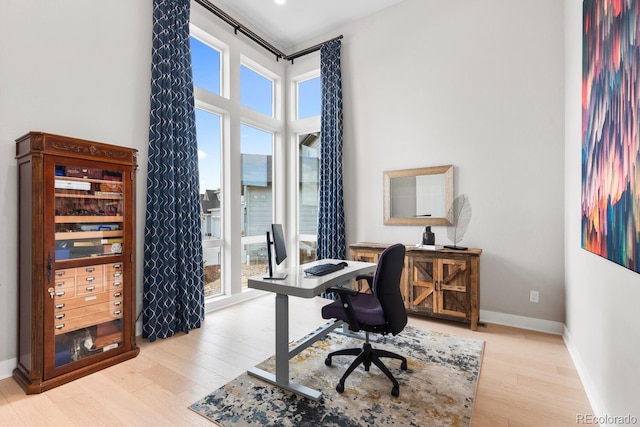 423 Rogers Way, Castle Rock, CO 80104 - office area featuring wood finished floors and baseboards