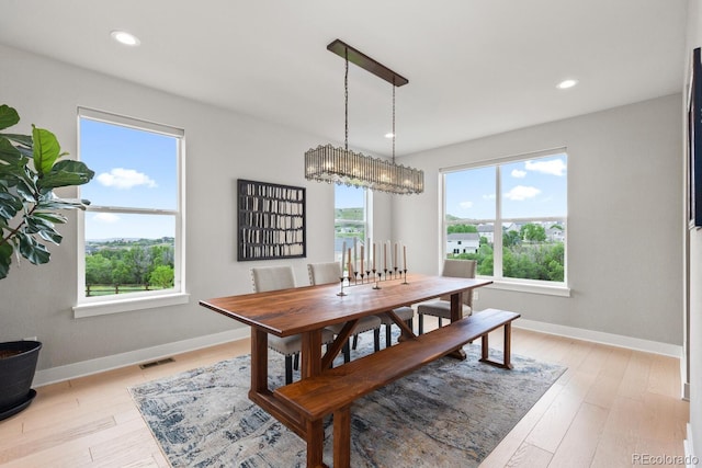 423 Rogers Way, Castle Rock, CO 80104 - dining room featuring light wood-style floors, recessed lighting, and a chandelier