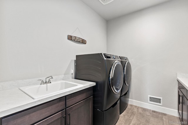 423 Rogers Way, Castle Rock, CO 80104 - washroom with separate washer and dryer and cabinet space