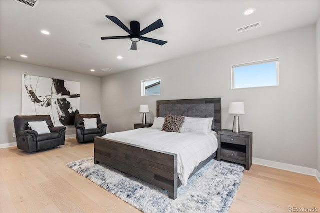 423 Rogers Way, Castle Rock, CO 80104 - bedroom featuring wood finished floors, multiple windows, recessed lighting, and ceiling fan
