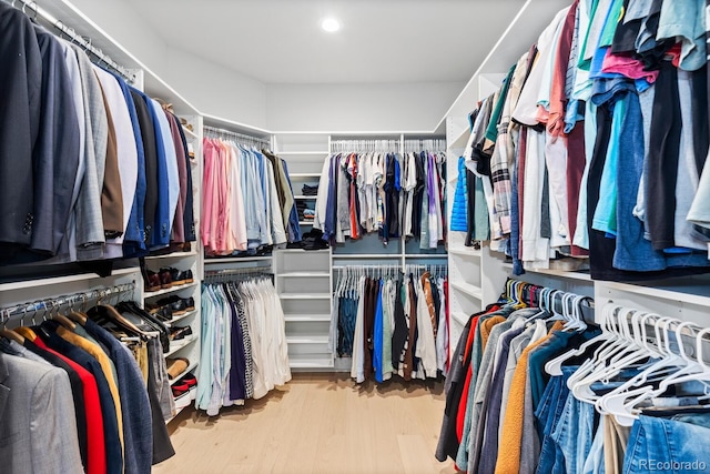 423 Rogers Way, Castle Rock, CO 80104 - spacious closet featuring wood finished floors