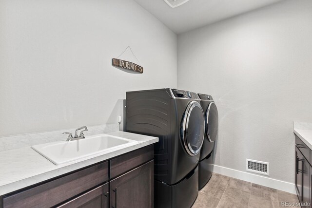 423 Rogers Way, Castle Rock, CO 80104 - laundry room with independent washer and dryer and cabinet space