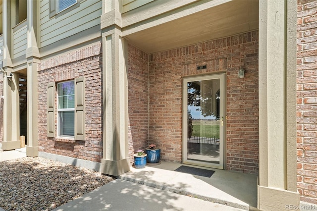 23346 E 5th Pl Unit 101, Aurora, CO 80018 - entrance to property with brick siding