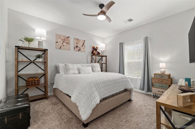 23346 E 5th Pl Unit 101, Aurora, CO 80018 - bedroom featuring light colored carpet, a ceiling fan, and baseboards