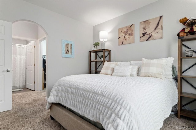 23346 E 5th Pl Unit 101, Aurora, CO 80018 - carpeted bedroom with arched walkways