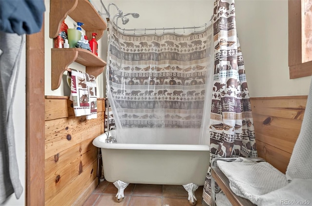 full bath featuring tile patterned flooring, curtained shower, and a tub