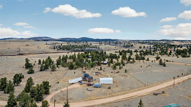 overview of rural landscape with a mountainous background and a desert landscape