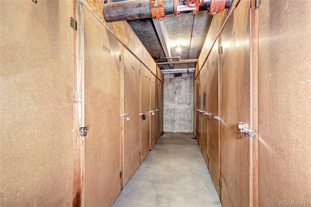 corridor with concrete flooring