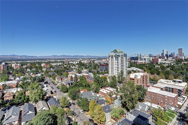 aerial view featuring a view of city and a mountain view