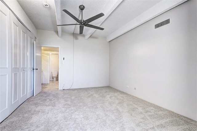 130 N Pearl St Unit 1606, Denver, CO 80203 - unfurnished bedroom featuring carpet floors, a textured ceiling, a closet, and a ceiling fan