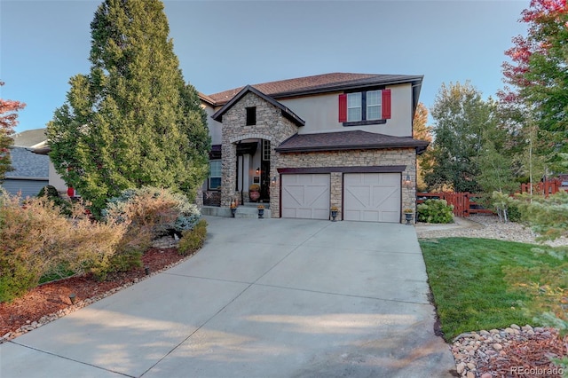 view of front of property with a garage