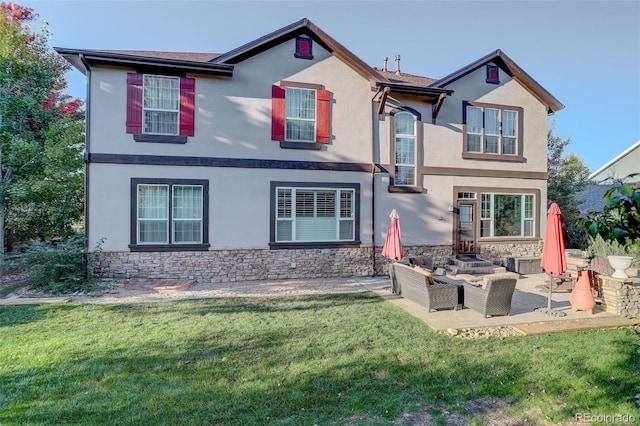 5033 Silver Feather Way, Broomfield, CO 80023 - back of property with stone siding, stucco siding, and a yard