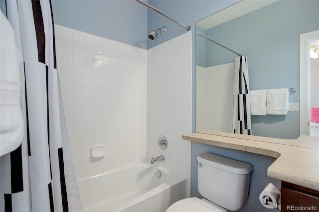 full bathroom featuring vanity, toilet, and shower / bath combo with shower curtain